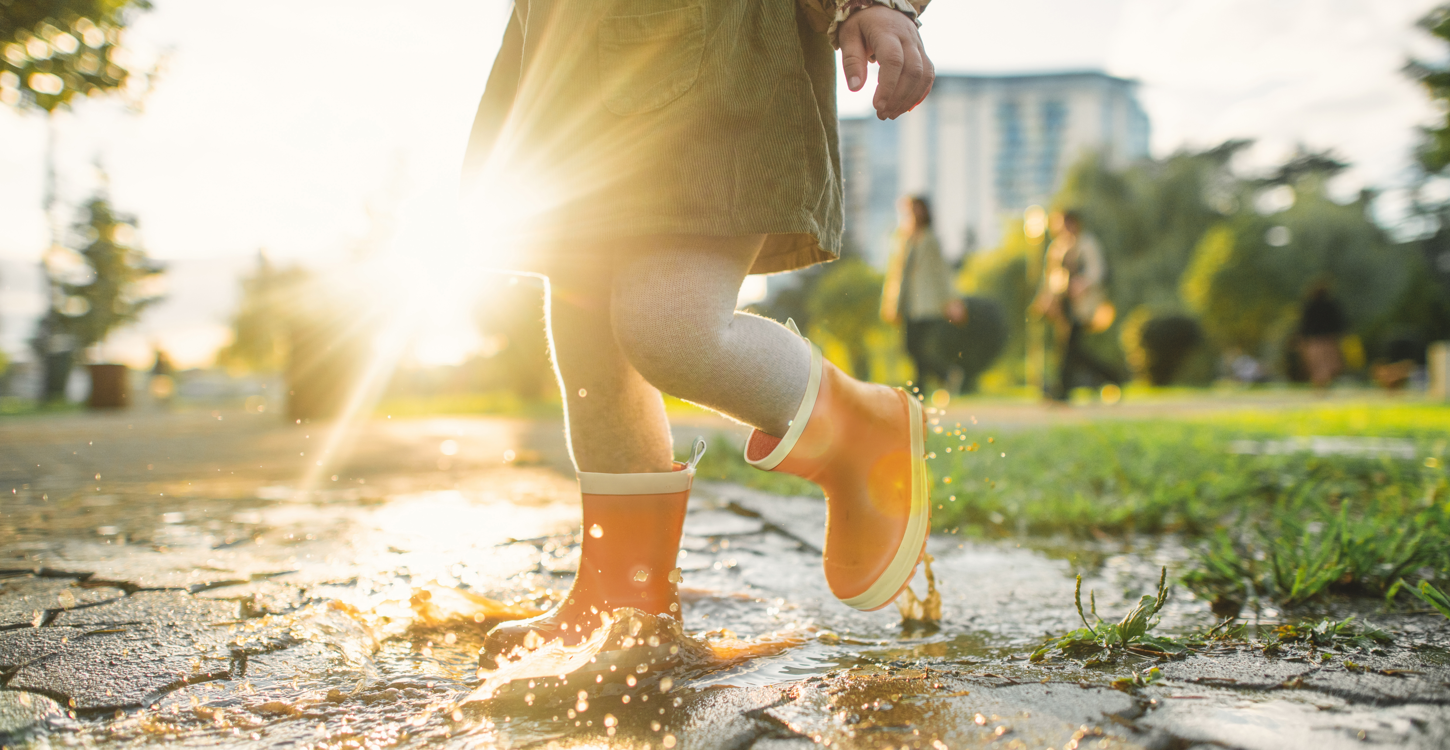 Child wearing WelliePaws boots outdoors