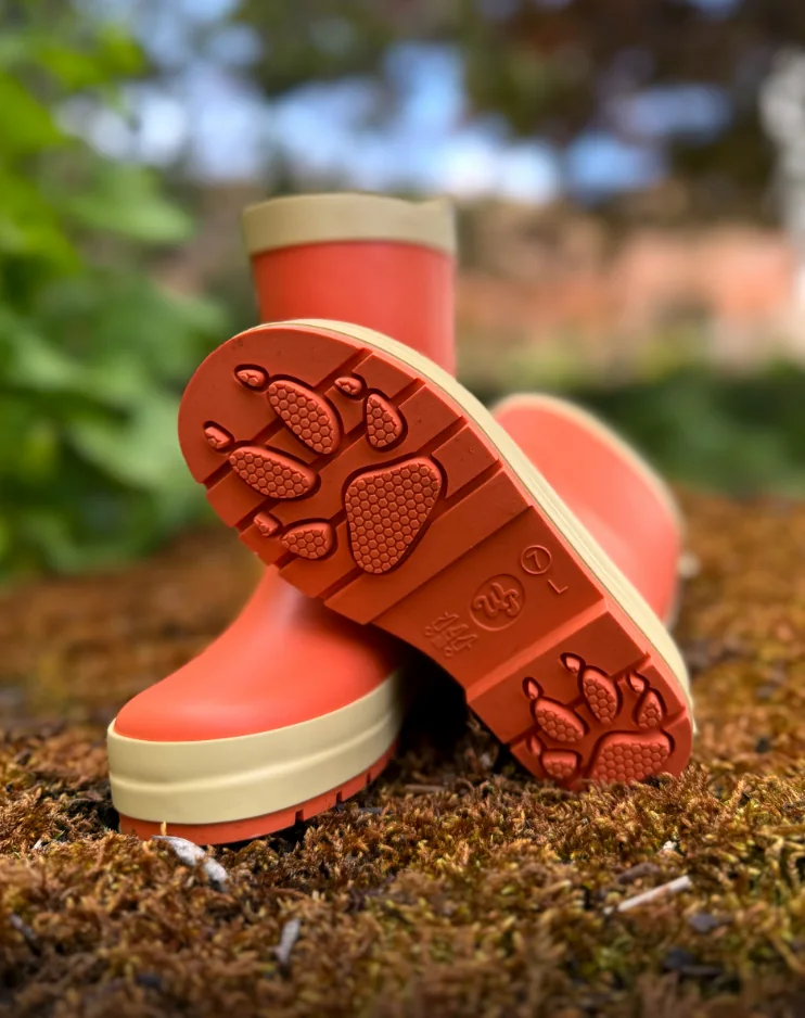 Dart the fox red WelliePaws boots showing the fox paw-print sole